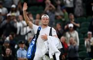 Tim van Rijthoven thanks the crowd after his Wimbledon 2022 match against Novak Djokovic.
